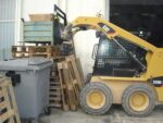 Porta-pallet trabajando con CAT 226B